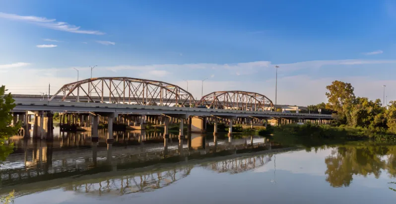Steel truss bridge crossing the river at Humble, Texas