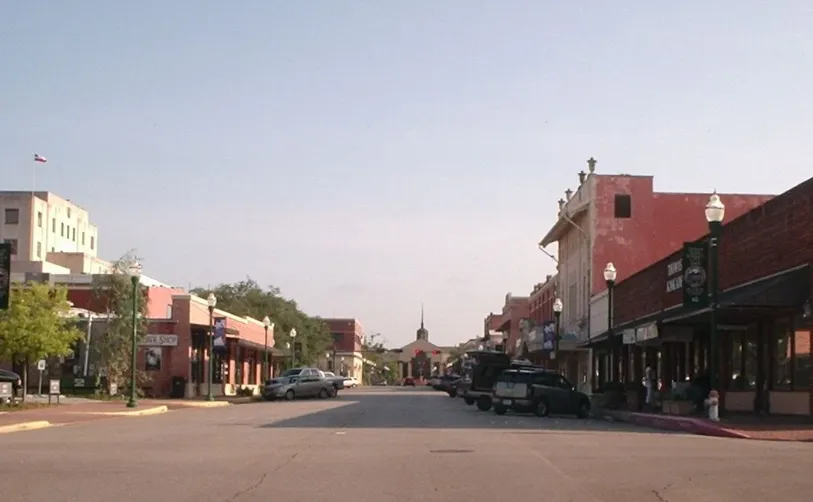 Historic brick storefronts on a downtown street in Montgomery, Texas
