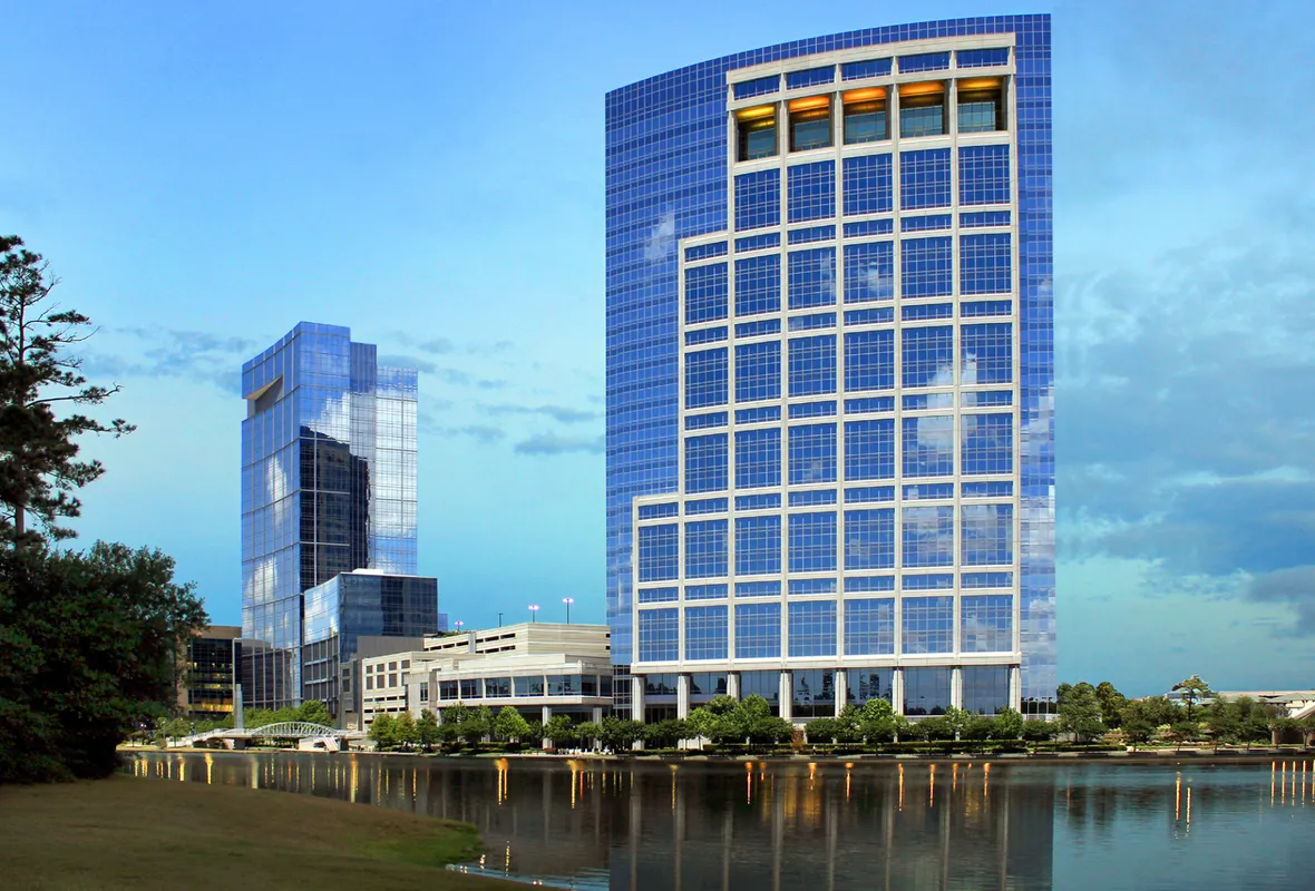 Glass office towers along The Woodlands Waterway in The Woodlands, Texas